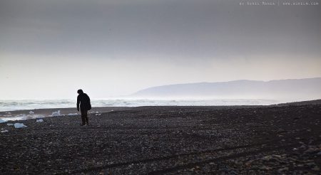 Iceland Jokulsarlon man on beach 02