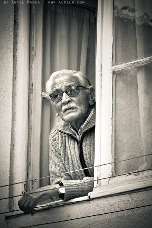 old man on a window