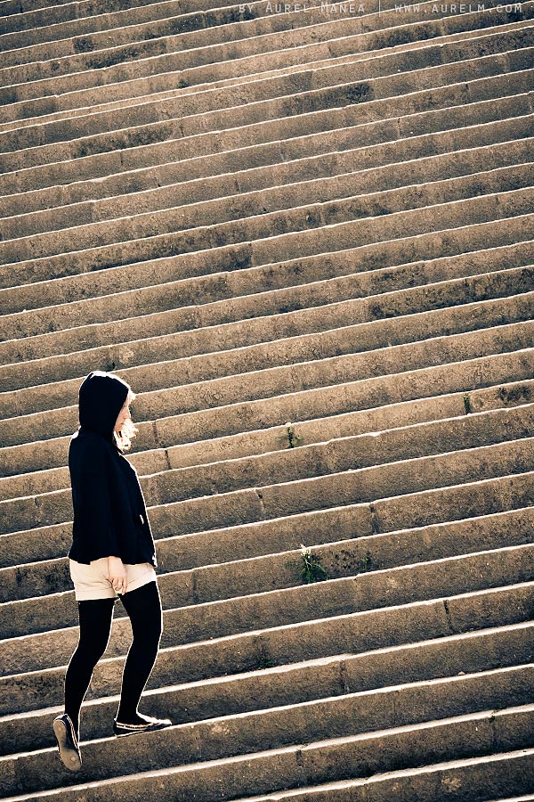 girl in black on stairs